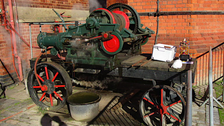 large steam-powered winch mounted on a substantial cart.