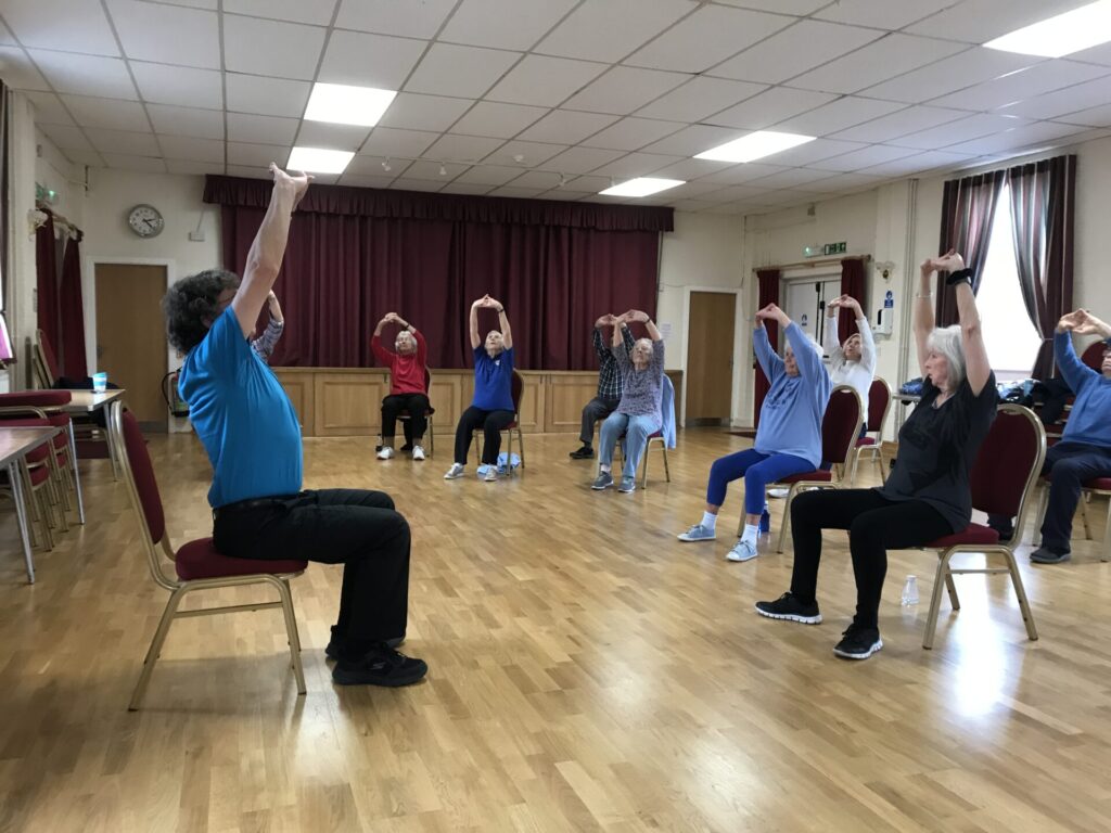 Group shoulder stretching exercise